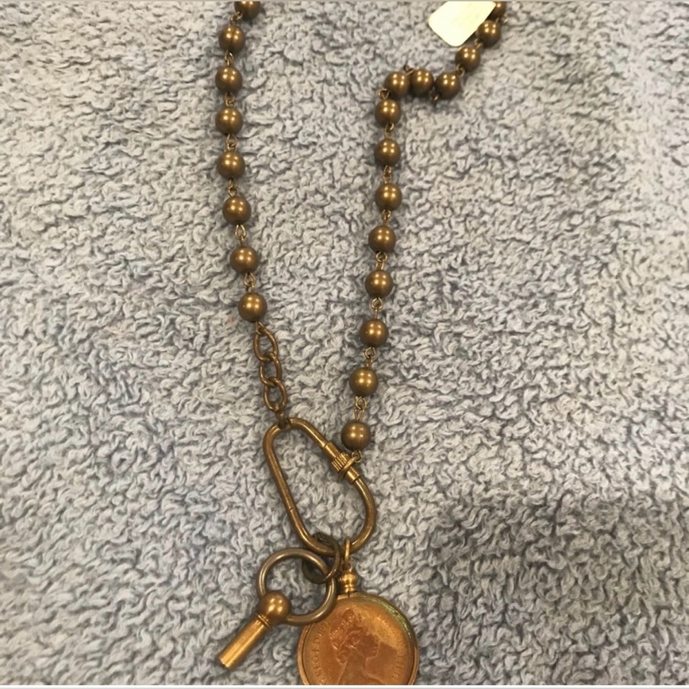 Erin Knight $238 design necklace-Swiss coin and metal tone antique looking..